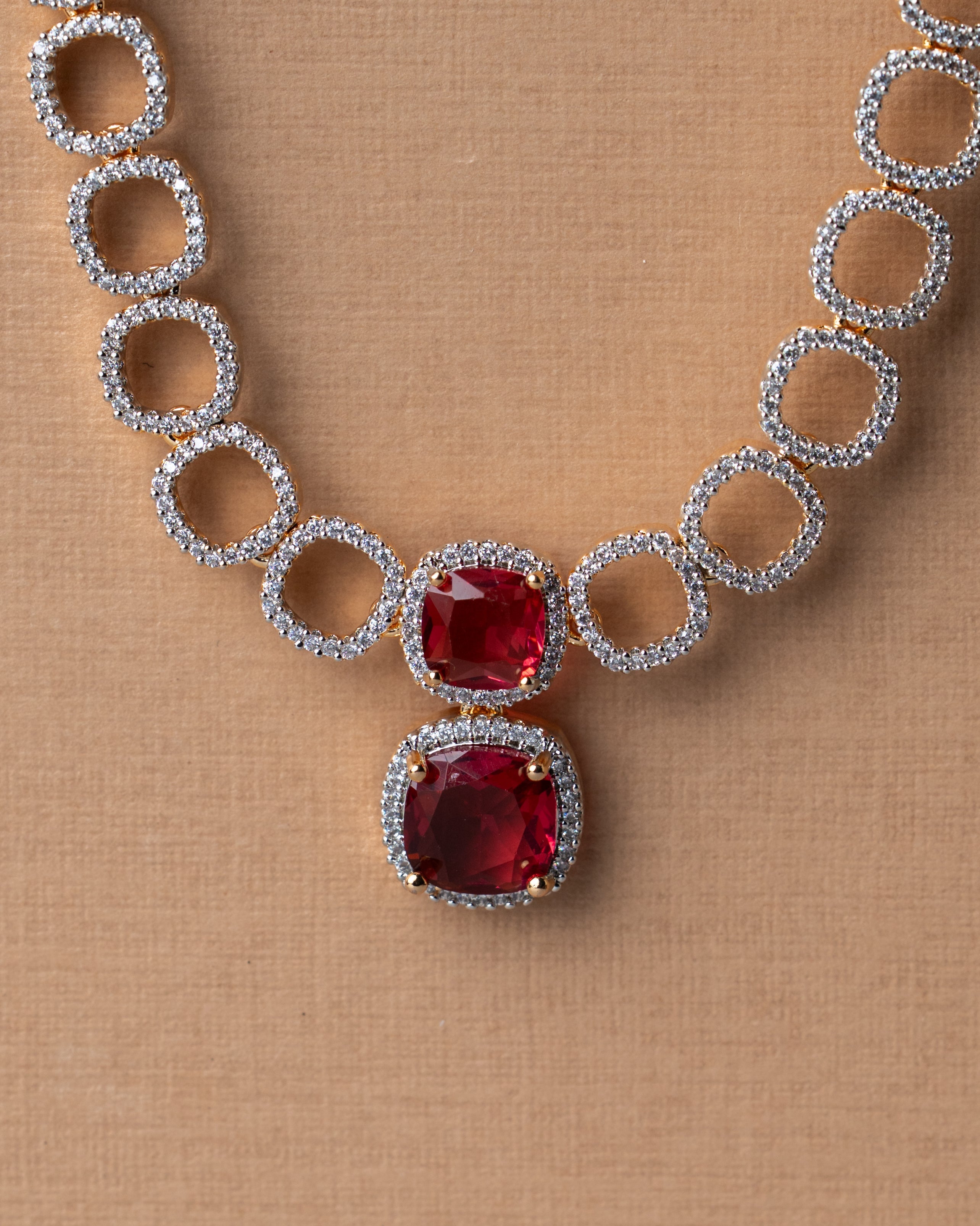 Gold-Toned Ruby and American Diamond (AD) Necklace Set.
