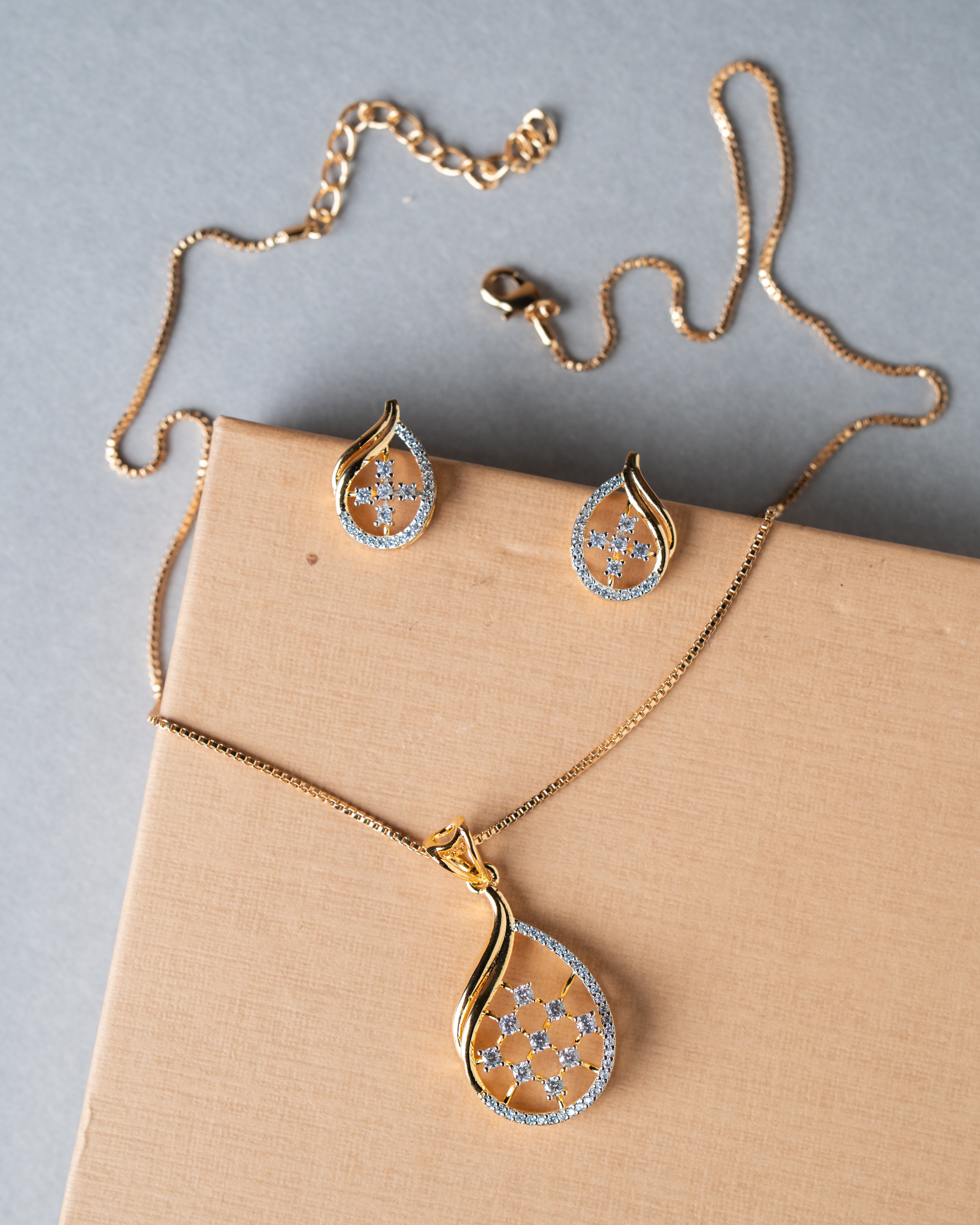 Gold-Toned American Diamond (AD) Floral Teardrop Pendant Set