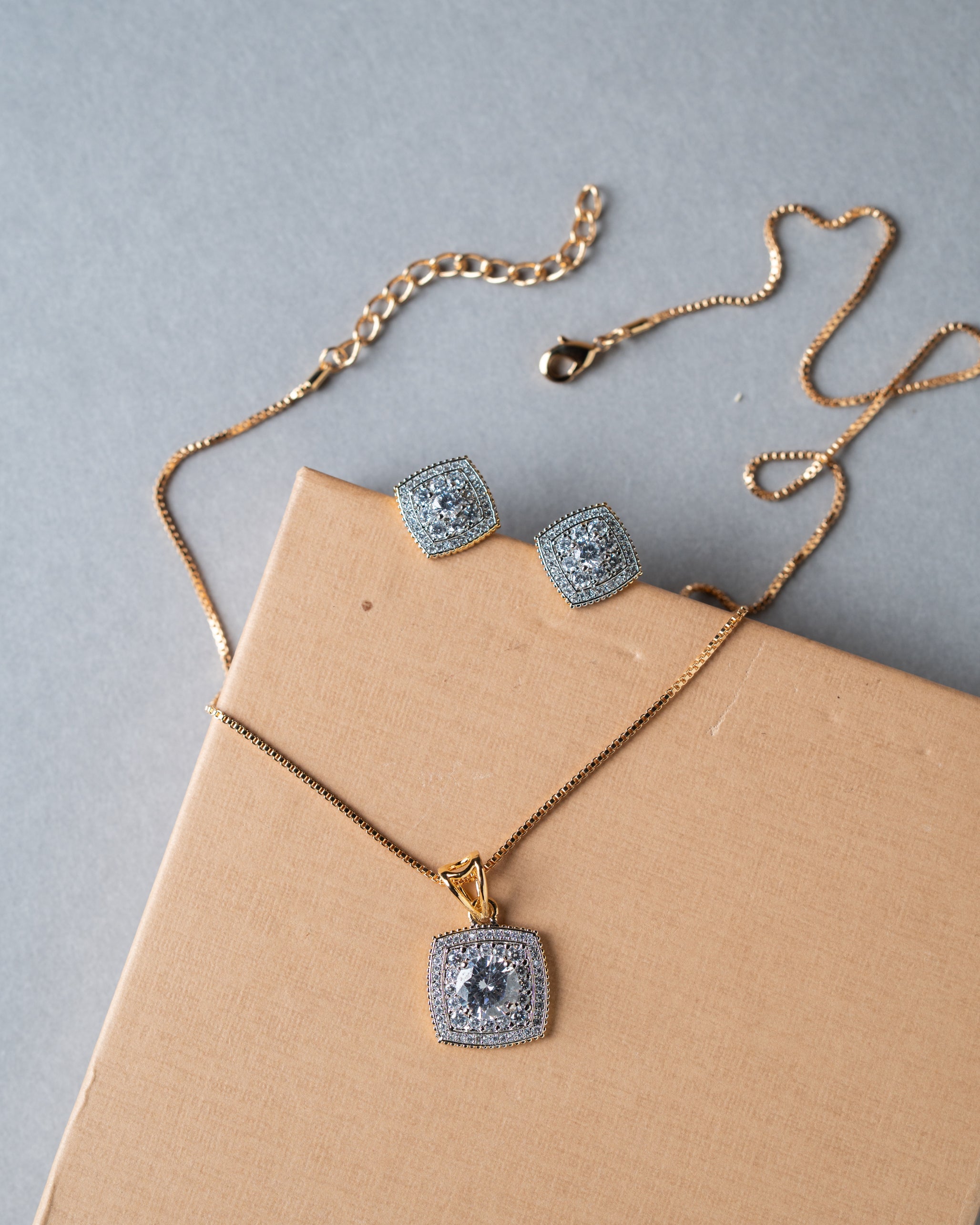 Gold-Toned American Diamond (AD) Halo Solitaire Pendant Set with Studs