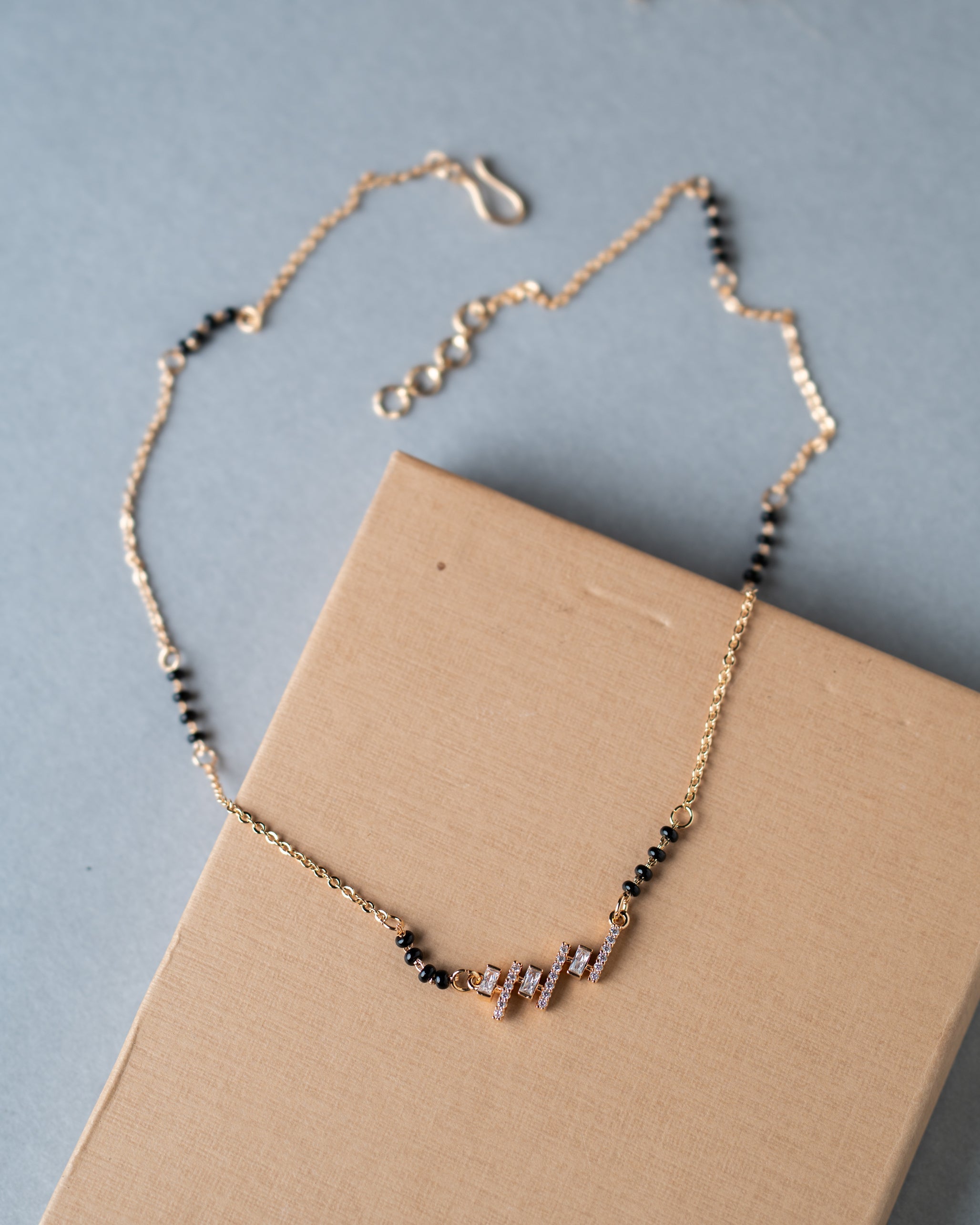 Modern Gold-Toned Zircon Mangalsutra with Geometric Pendant