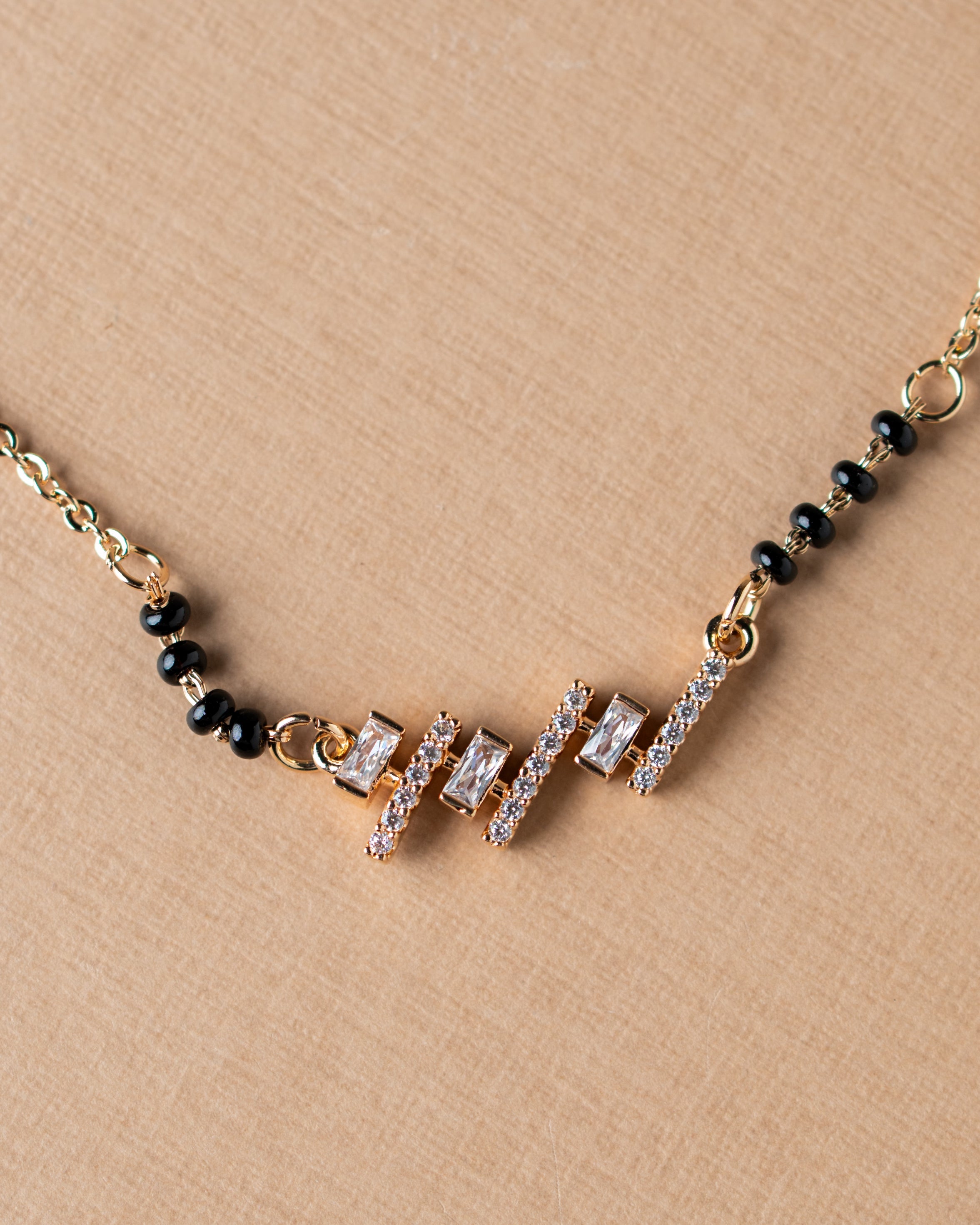 Modern Gold-Toned Zircon Mangalsutra with Geometric Pendant